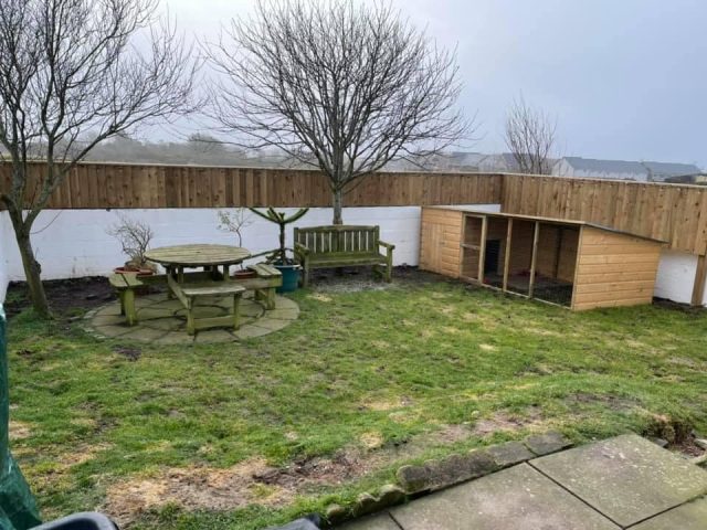 wooden cage before Artificial Grass | Easigrass Aberdeen